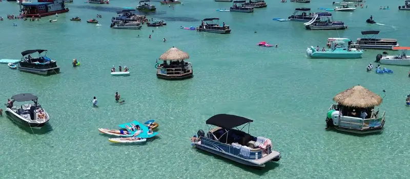 Boats working the nearshore water just outside the East Pass off Destin