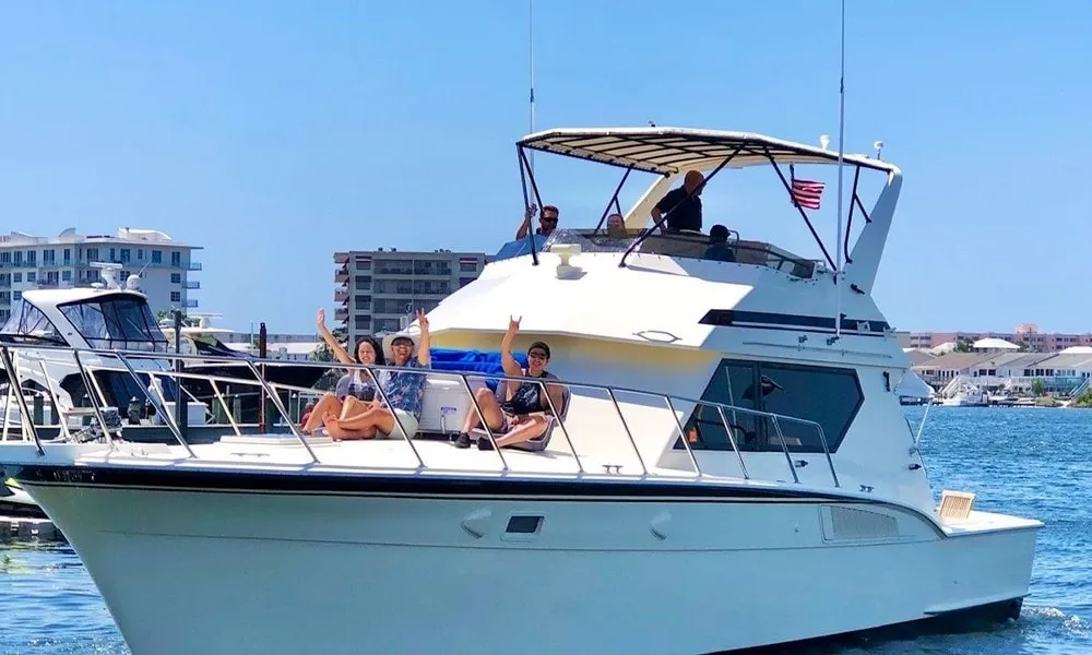 Guests aboard a nearshore fishing boat off the East Pass in Destin