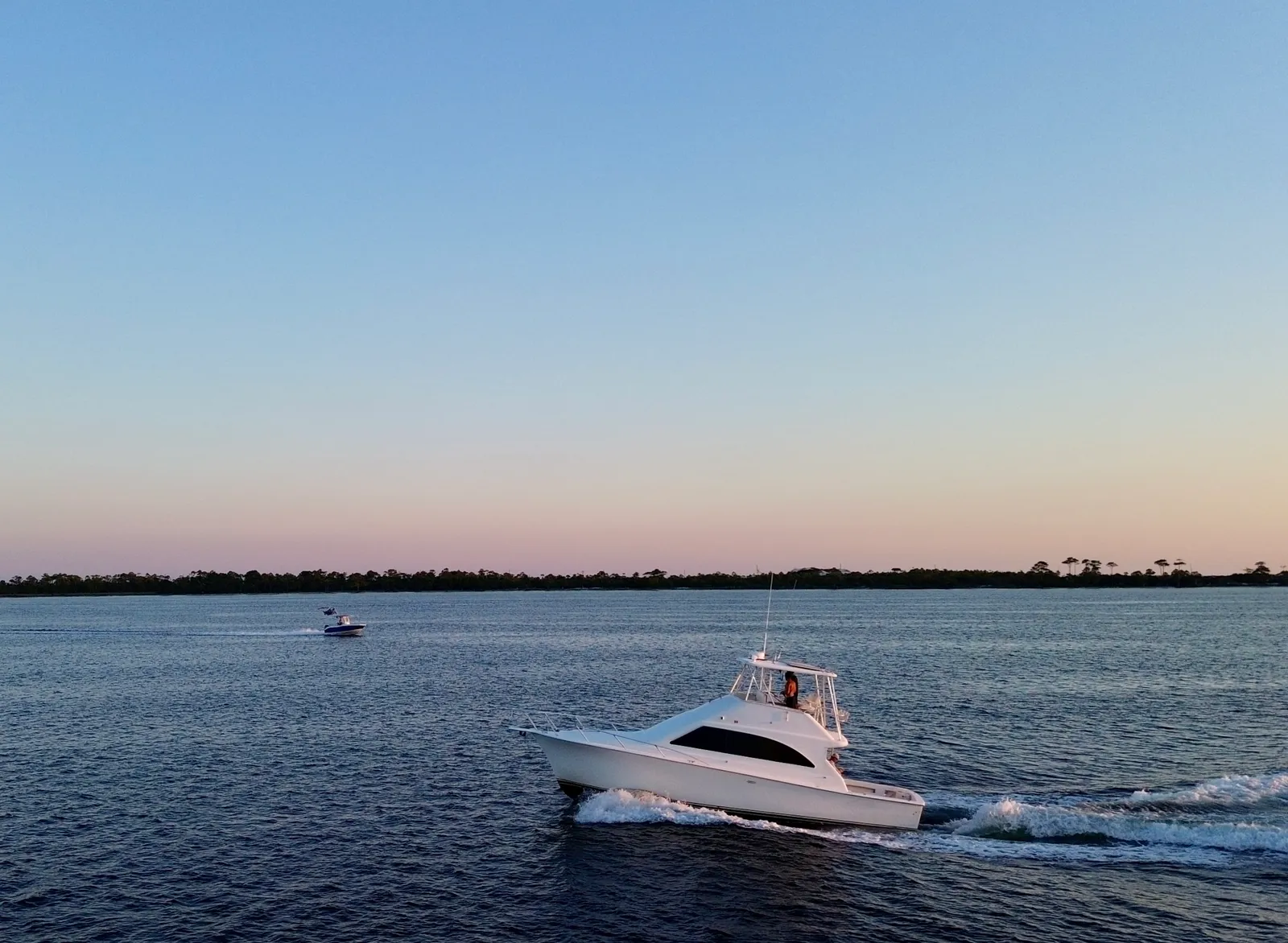 One of our three Crab Island pontoons anchored on the shallow sandbar in Destin